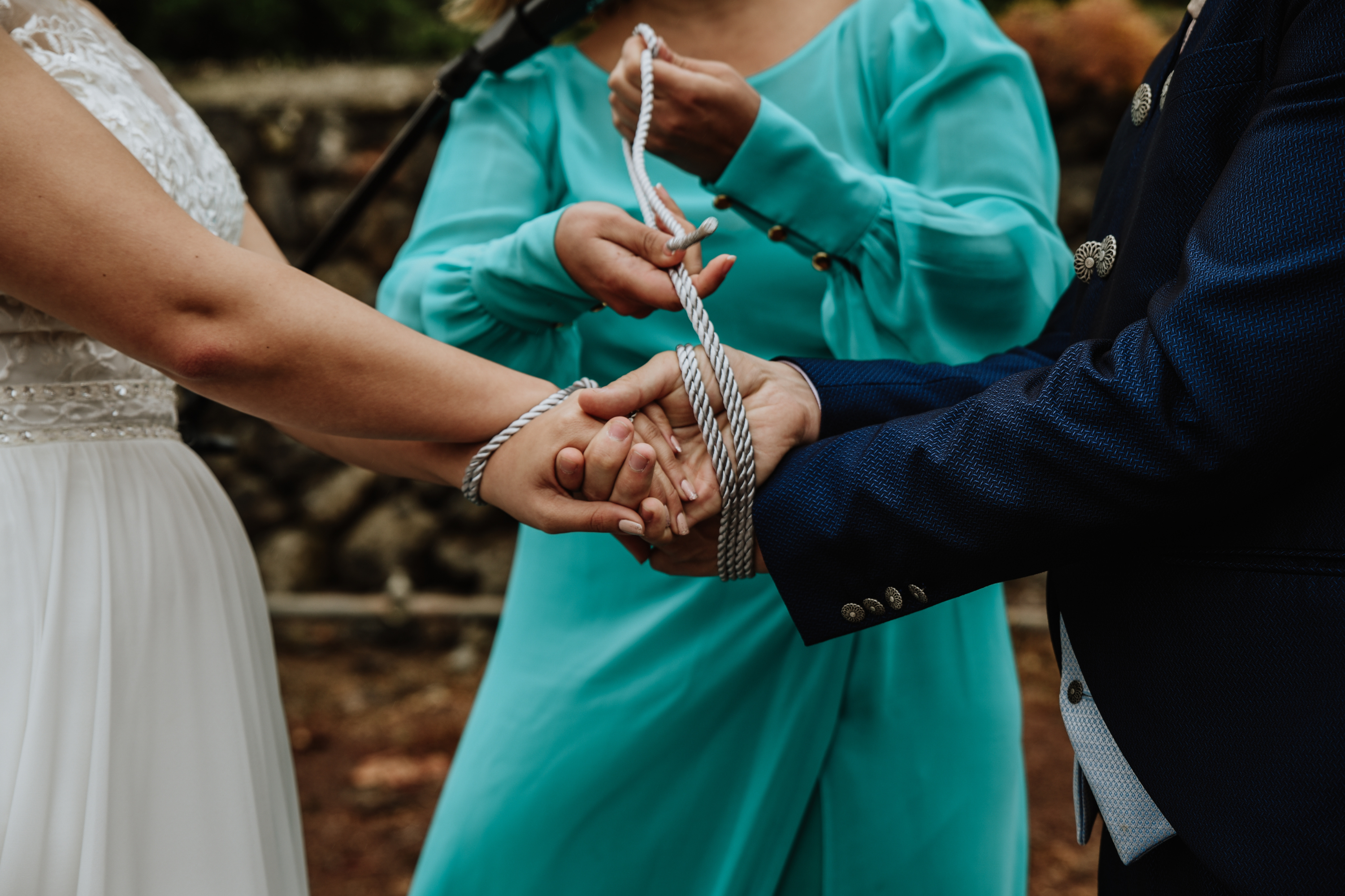 Handfasting ceremony performed by wedding celebrant