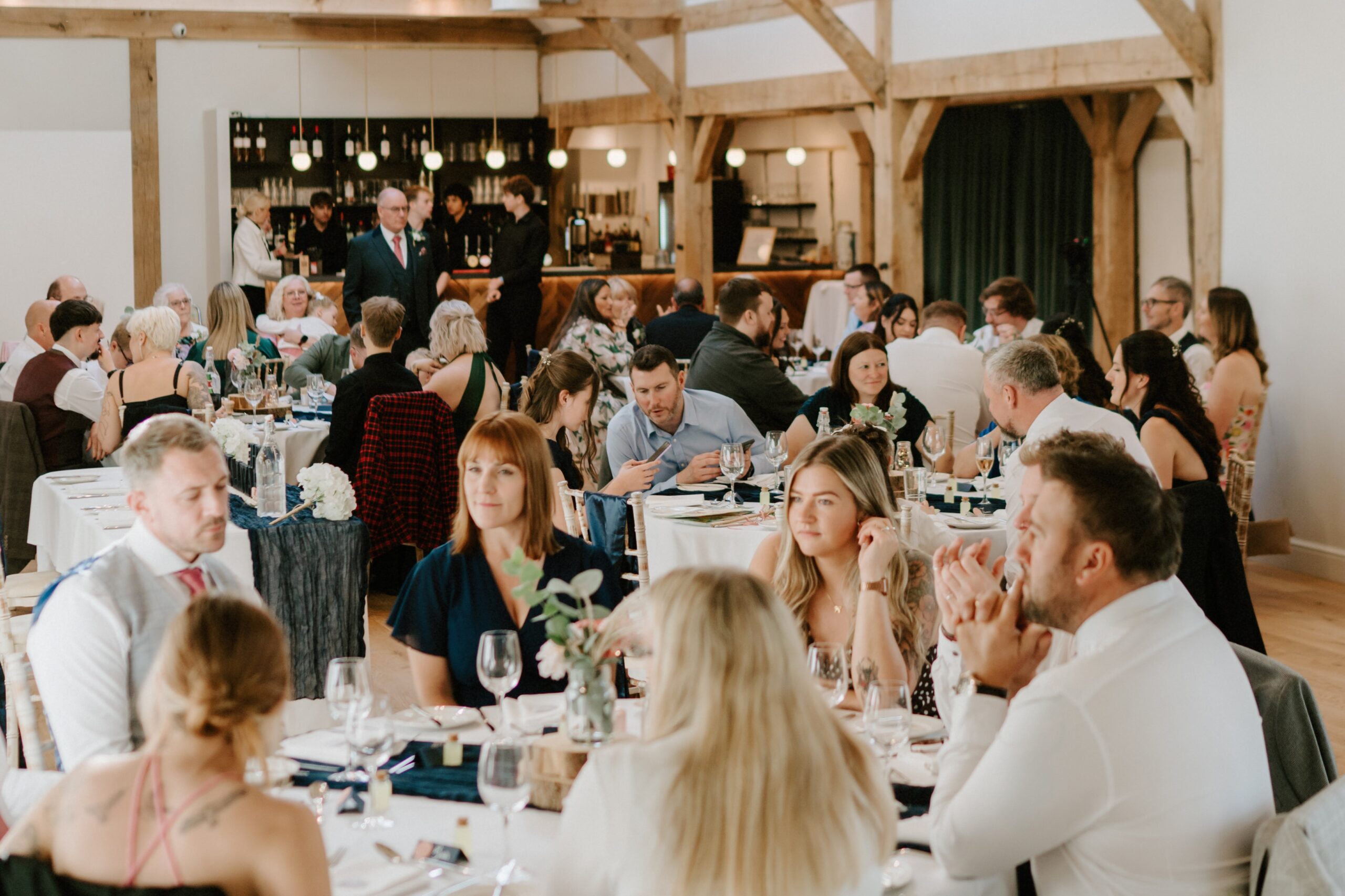 Guests seated for wedding breakfast at Alfriston Gardens