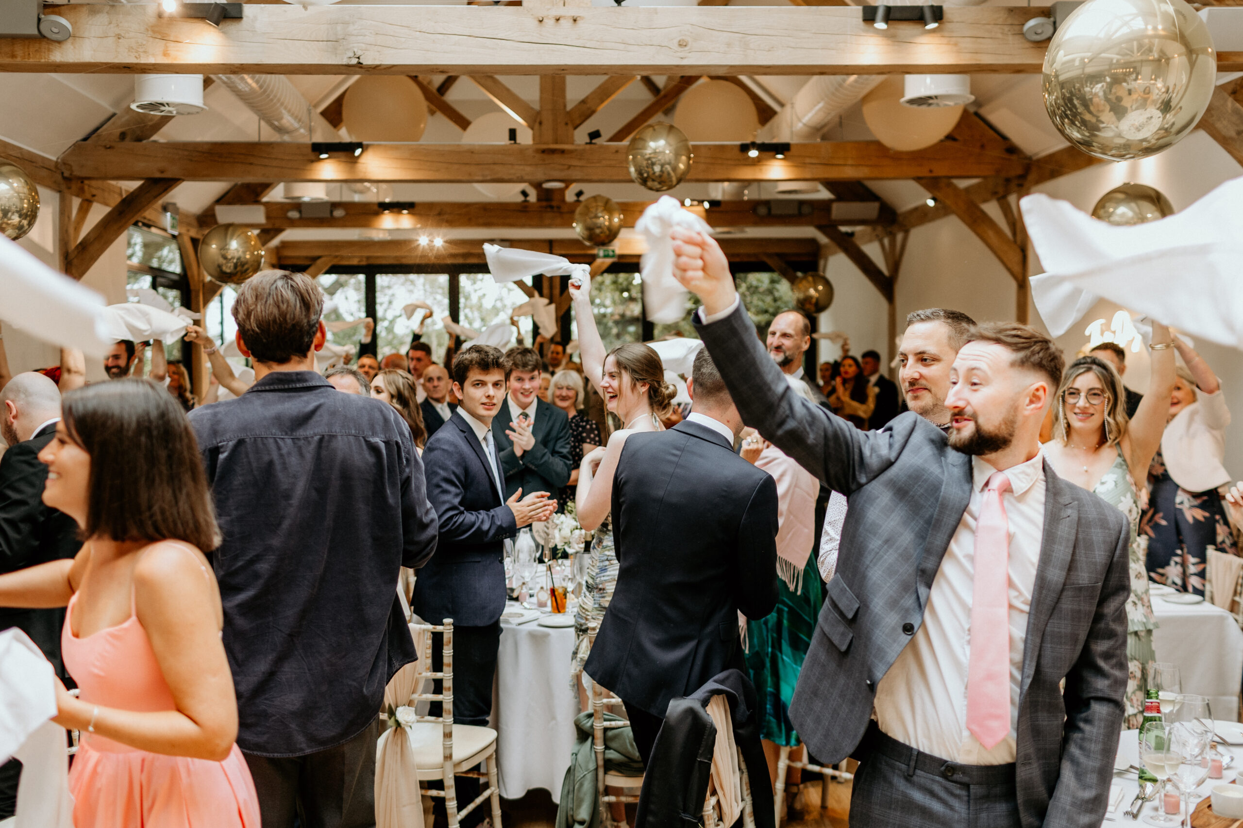 Wedding couple entrance into wedding reception at Alfriston Gardens